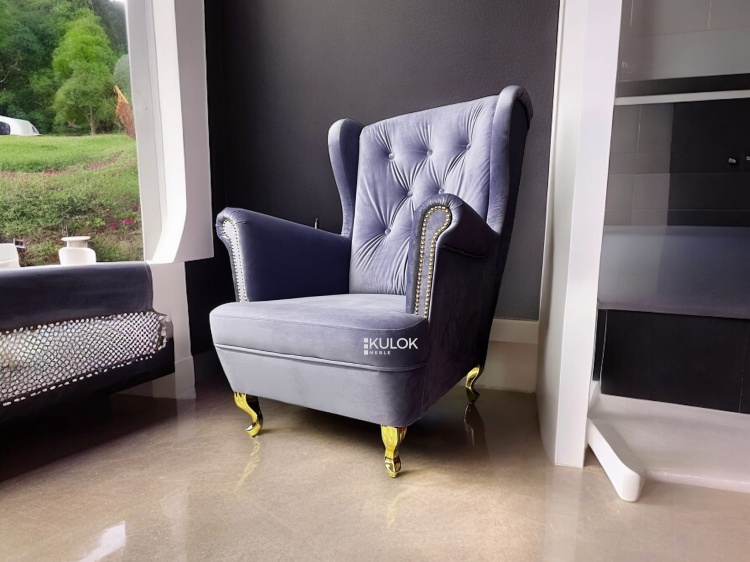 Fotel Uszak pikowany glamour z ćwiekami