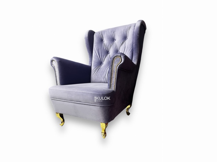 Fotel Uszak pikowany glamour z fioletowego weluru Magic Velvet
