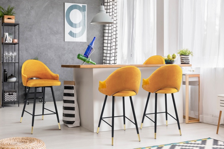 Designerski hoker tapicerowany Megan miodowy do nowoczesnych wnętrz