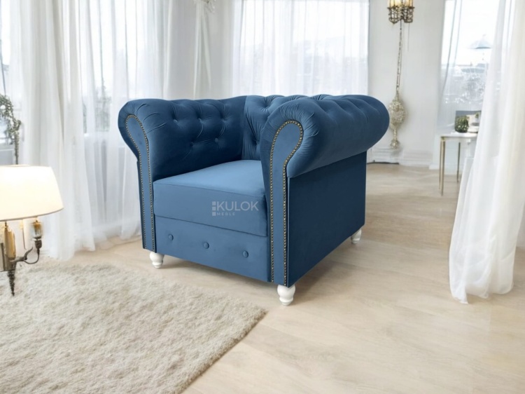 Fotel Chesterfield niebieski – tapicerowany Magic Velvet z ozdobami