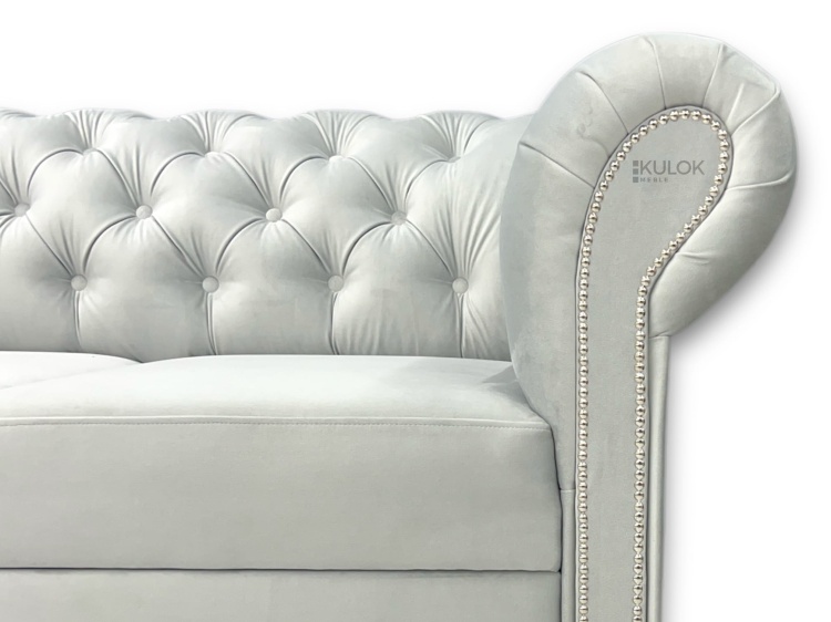 sofa Chesterfield klasyczna pikowana do salonu glamour