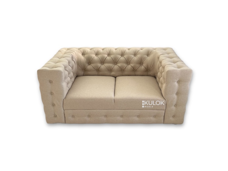 elegancka sofa pikowana w stylu klasycznym bok