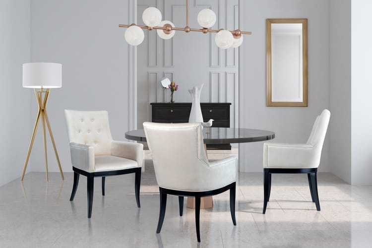 Nowoczesna aranżacja wnętrza z krzesłami Monte Pik – jadalnia glamour, jasna tkanina, krzesła przy okrągłym stole, czarne drewniane nogi i eleganckie wykończenie