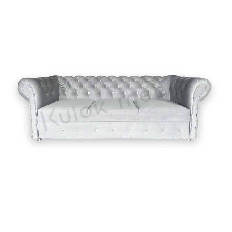 Pikowana sofa w szarym kolorze z subtelnymi kryształkami