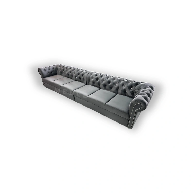 Wybierz elegancję Magic Velvet 2271 - grafitowego materiału, który podkreśla nowoczesny design 6-osobowej Sofy Chesterfield Pro.