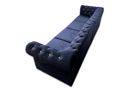 Tapicerowana sofa chesterfield 4 osobowa do salonu ze spaniem i kryształkami