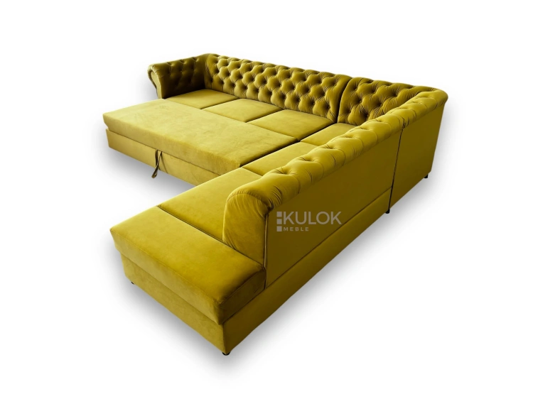 Narożnik Chesterfield Dubai Bis z drewnianą konstrukcją i pikowaniami.
