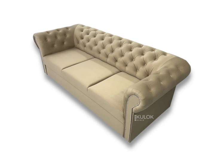 elegancka sofa z funkcją spania chesterfield