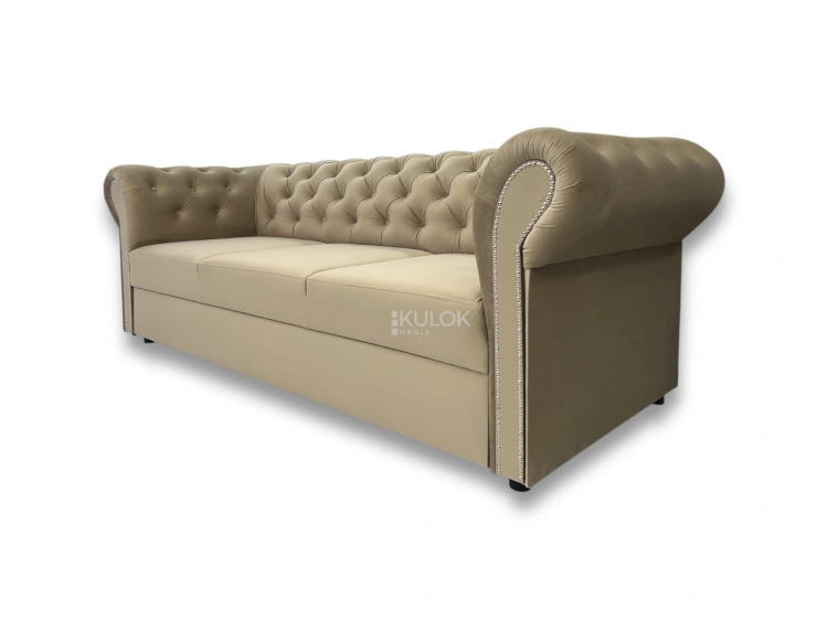 pikowana sofa glamour srebrna listwa