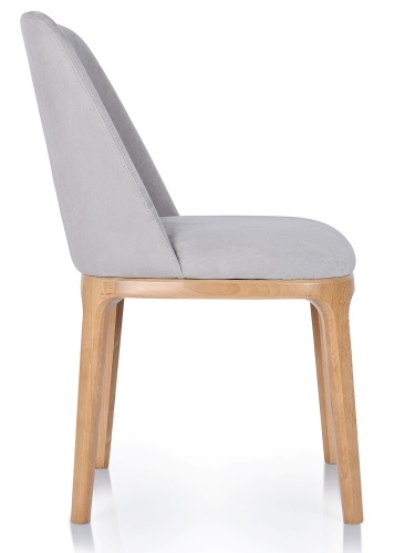 Krzesło Ravalo w kolorze szarym, profil boczny, miękkie tapicerowane siedzisko i ergonomiczne oparcie – meble do kuchni i salonu