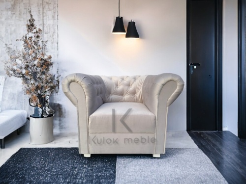 Chesterfield klasyczny fotel w salon nowoczesny ciemno-beżowy biały. Klasyczny pikowany jednoosobowy fotel welur.