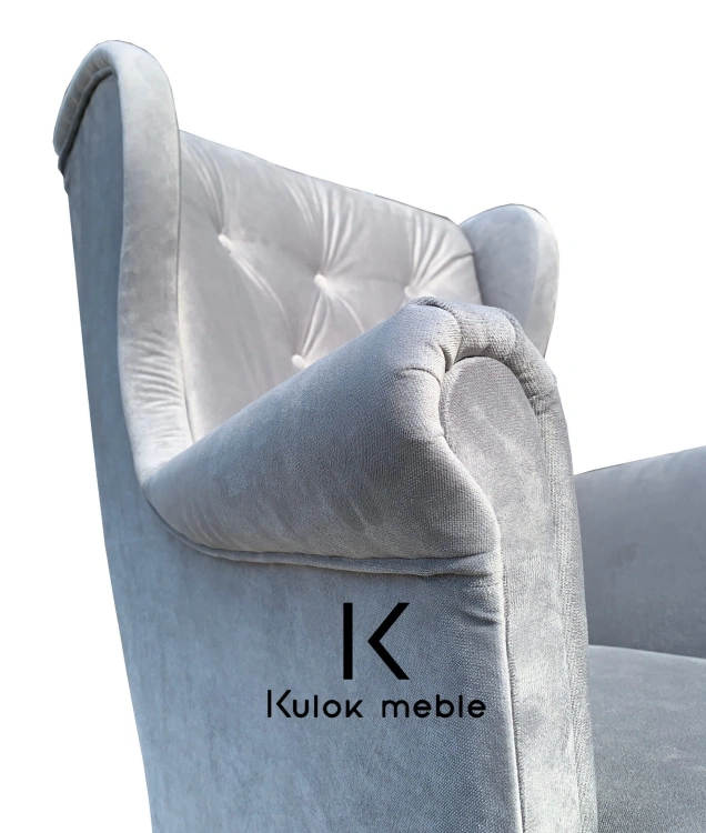 Stylowy Fotel Uszak z Wyrafinowanym Pikowaniem - Unikatowe Połączenie Komfortu i Elegancji.