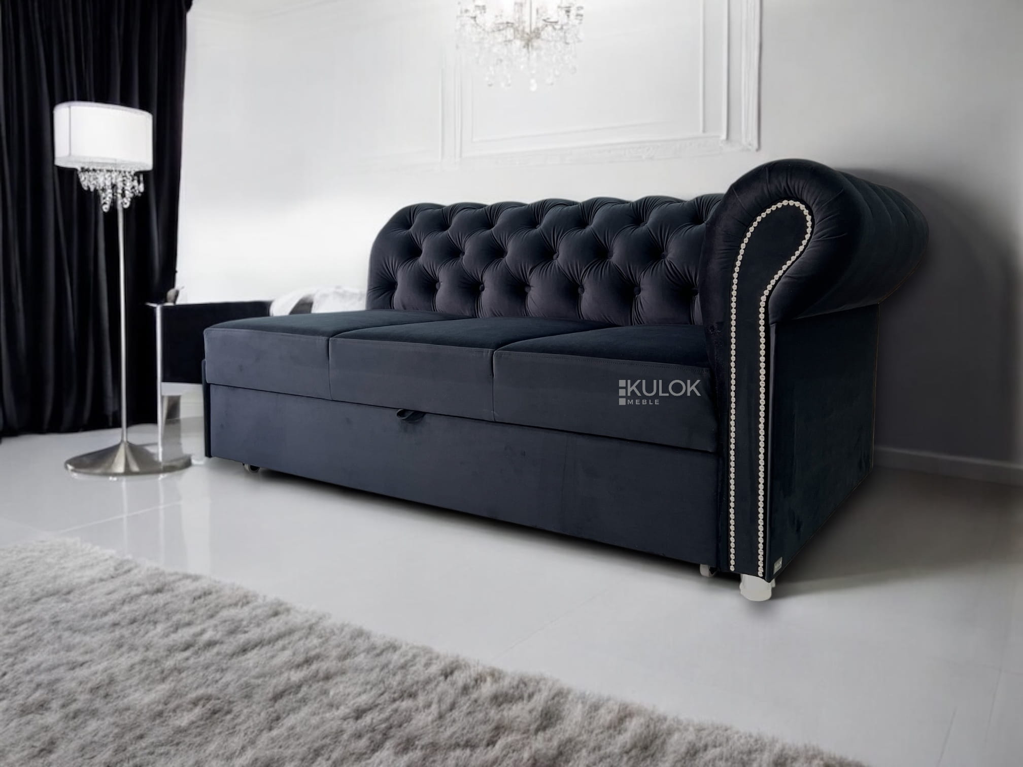 Czarny szezlong Chesterfield pikowany z funkcją spania Magic Velvet 2219 – 170 cm szerokości – srebrne dodatki